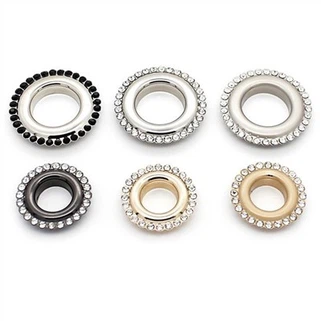 Grommets metàl·lics per a tela