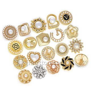 Botons d'or per a abric