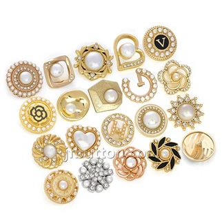 Botons d'or per a abric