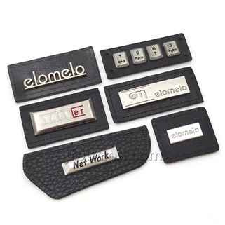 Etiquetes de teixit de cuir personalitzades